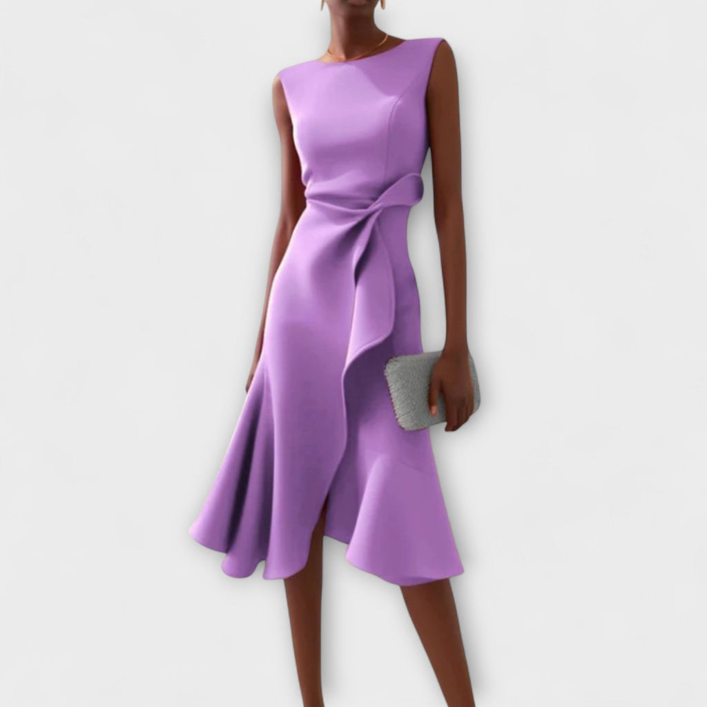 Vestido midi entallado y femenino de silueta favorecedora
