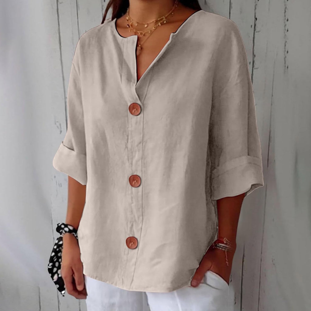 Blusa ligera de aspecto lino con bajo corto