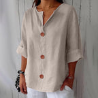 Blusa ligera de aspecto lino con bajo corto