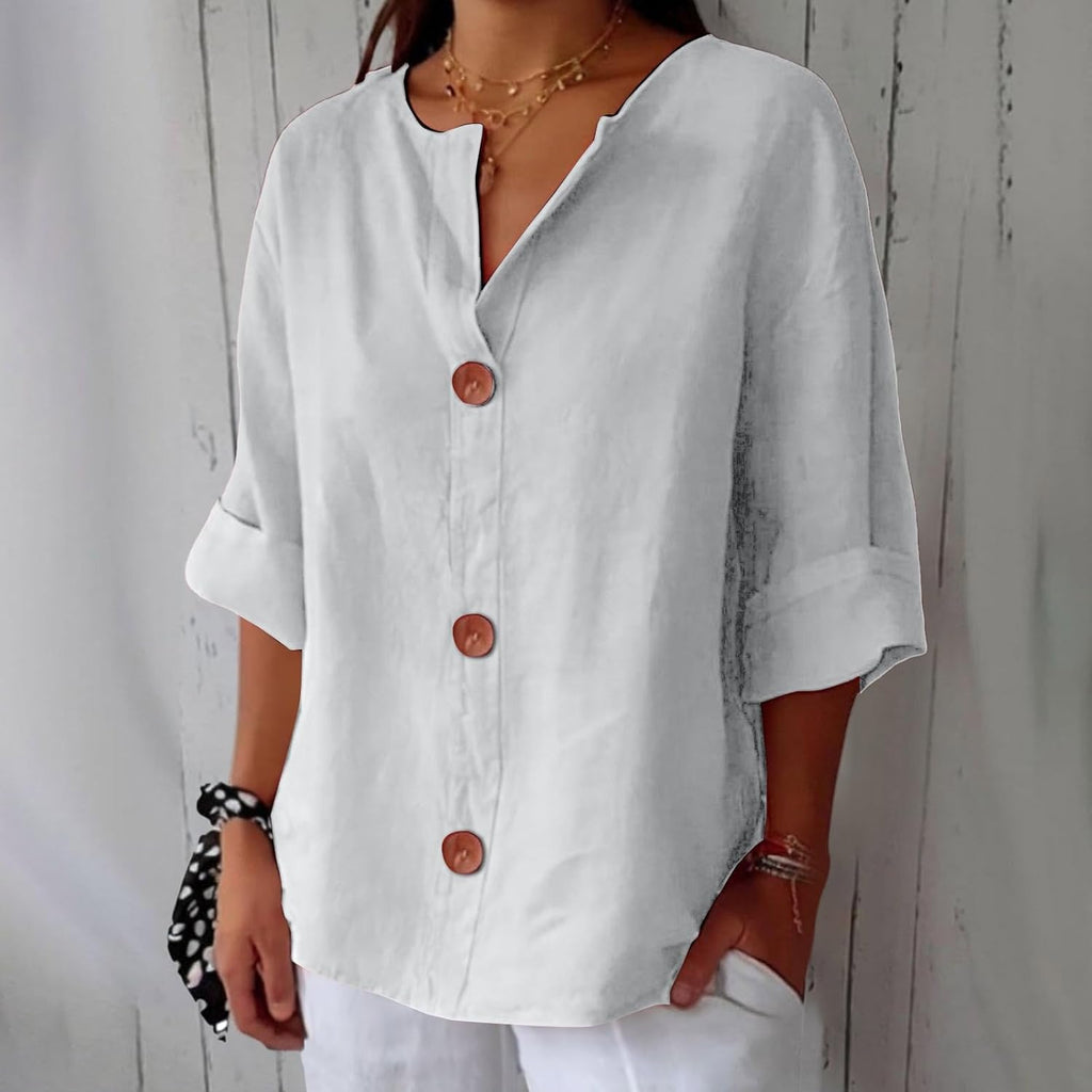 Blusa ligera de aspecto lino con bajo corto