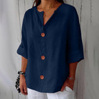 Blusa ligera de aspecto lino con bajo corto