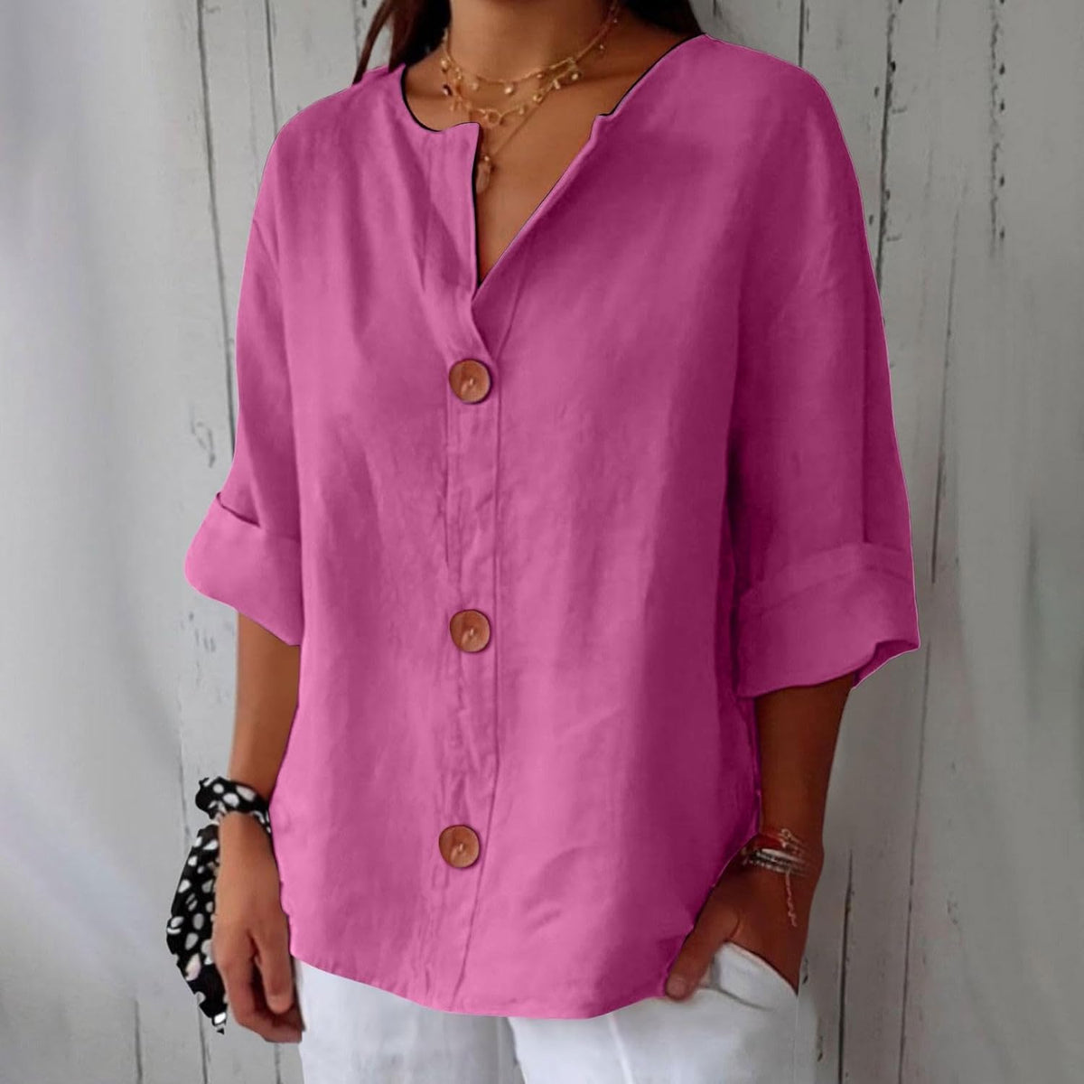 Blusa ligera de aspecto lino con bajo corto