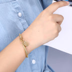 Saint Benedict Charm Bracelet in a Warm Gold Tone