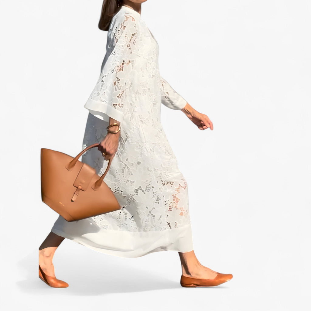 Vestido midi de encaje floral con mangas transparentes y cintura ajustada