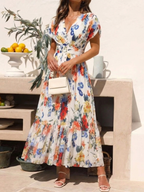 Vestido midi floral plisado con escote de pico
