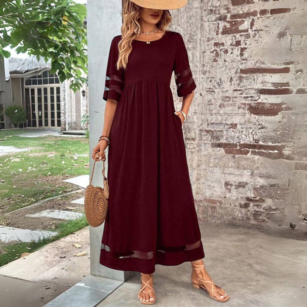 Vestido midi reductor con un perfil limpio y elegante