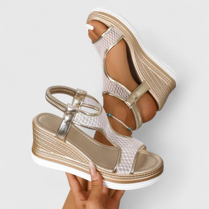 Sandalias de cuña con base elevada y estable