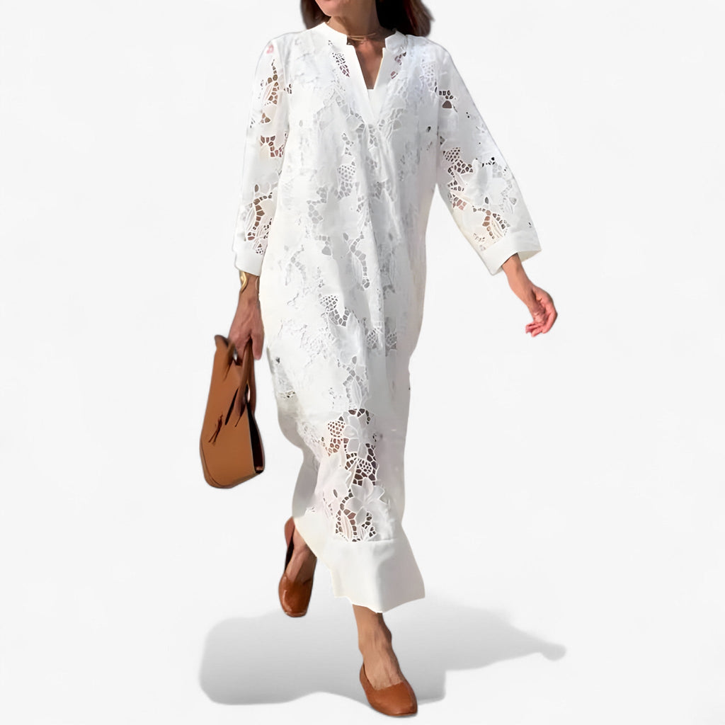 Vestido midi de encaje floral con mangas transparentes y cintura ajustada