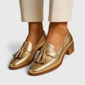 Loafers i guld med enkel avtagning