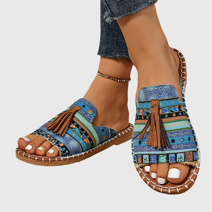 Dämpad sandal med ovandel som andas