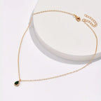 Fine Chain Necklace with Tiny Dark Stone in Gold Colour