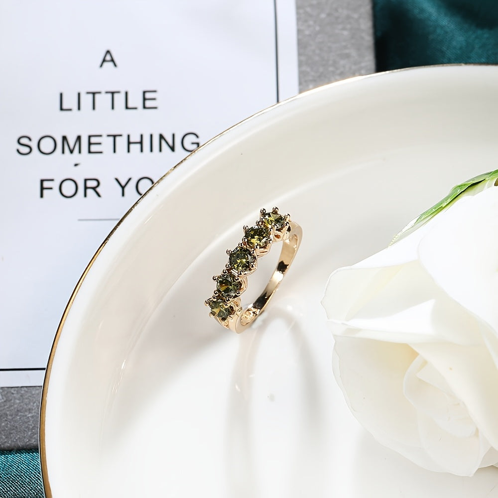 Olive Green Cubic Zirconia Ring with Vintage-Style Setting