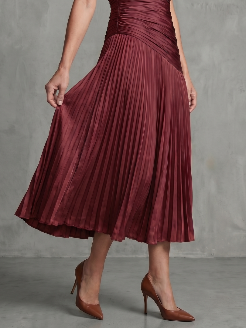 Vestido midi plisado de rayas con cuerpo ajustado