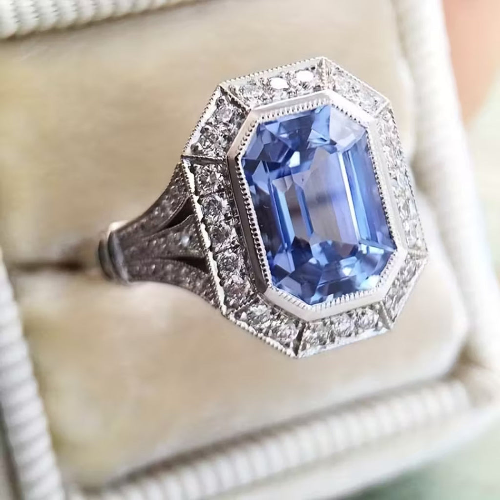 Blue Stone Crown Ring with Vintage-Style Setting and Regal Shape