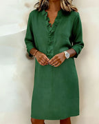 Vestido de algodón y lino con cuello de pico y detalle de volantes