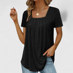 Blusa de verano con escote cuadrado y pliegues sutiles