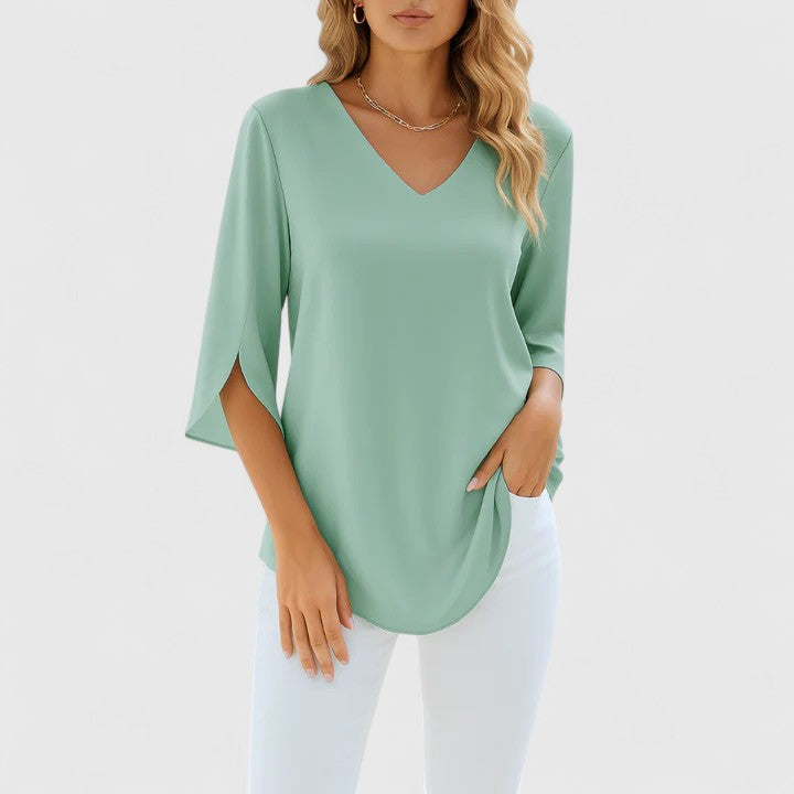 Blusa con escote de pico profundo y detalle de abertura en la manga