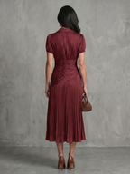 Vestido midi plisado de rayas con cuerpo ajustado