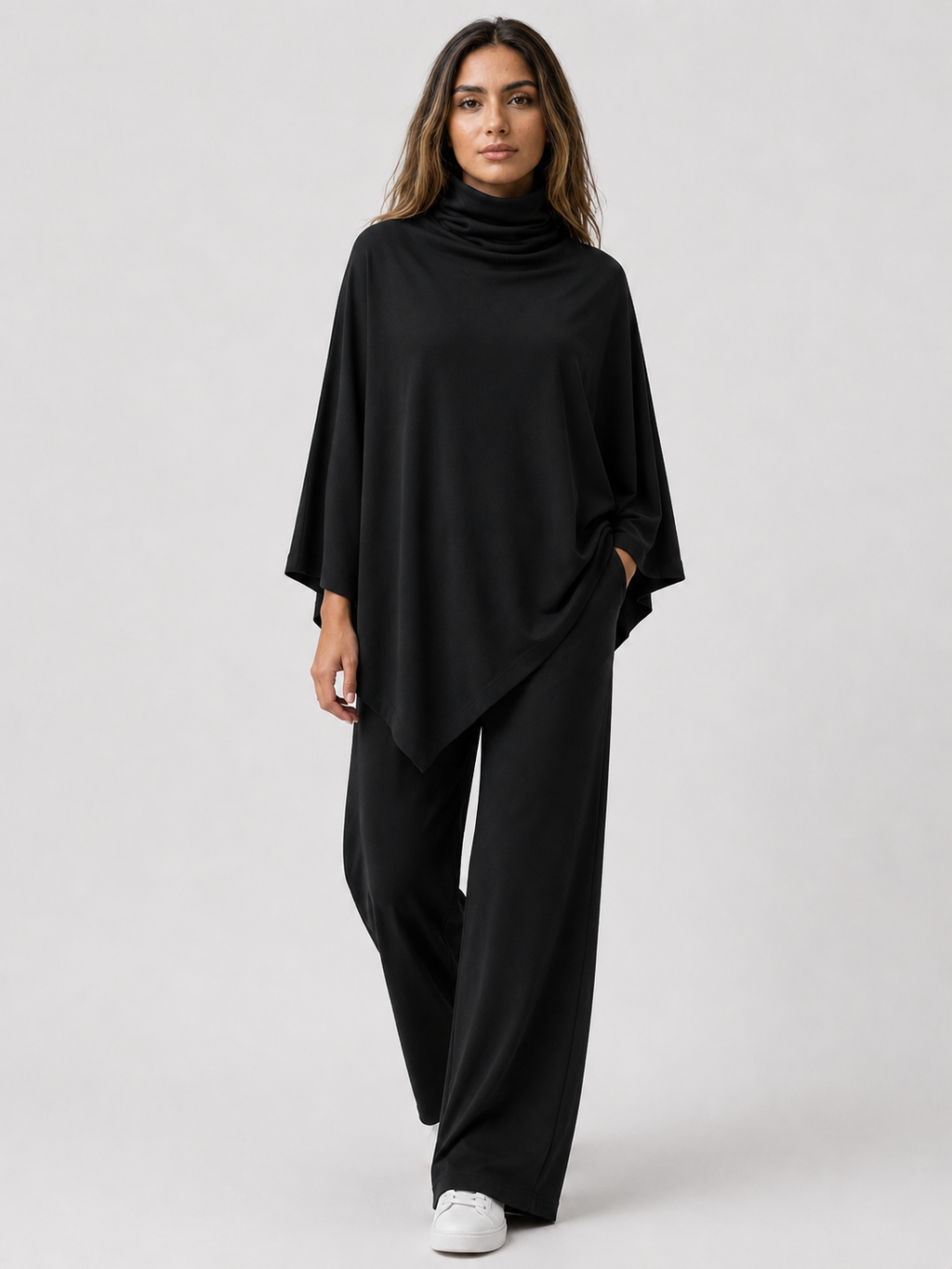 Conjunto de top poncho con cuello drapeado y pantalones rectos