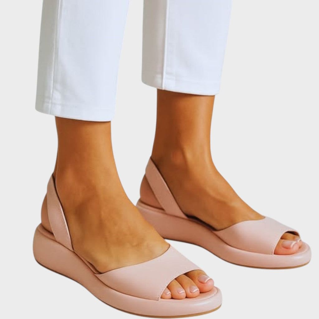 Slip in-sandaler med vadderad innersula och lätt sula