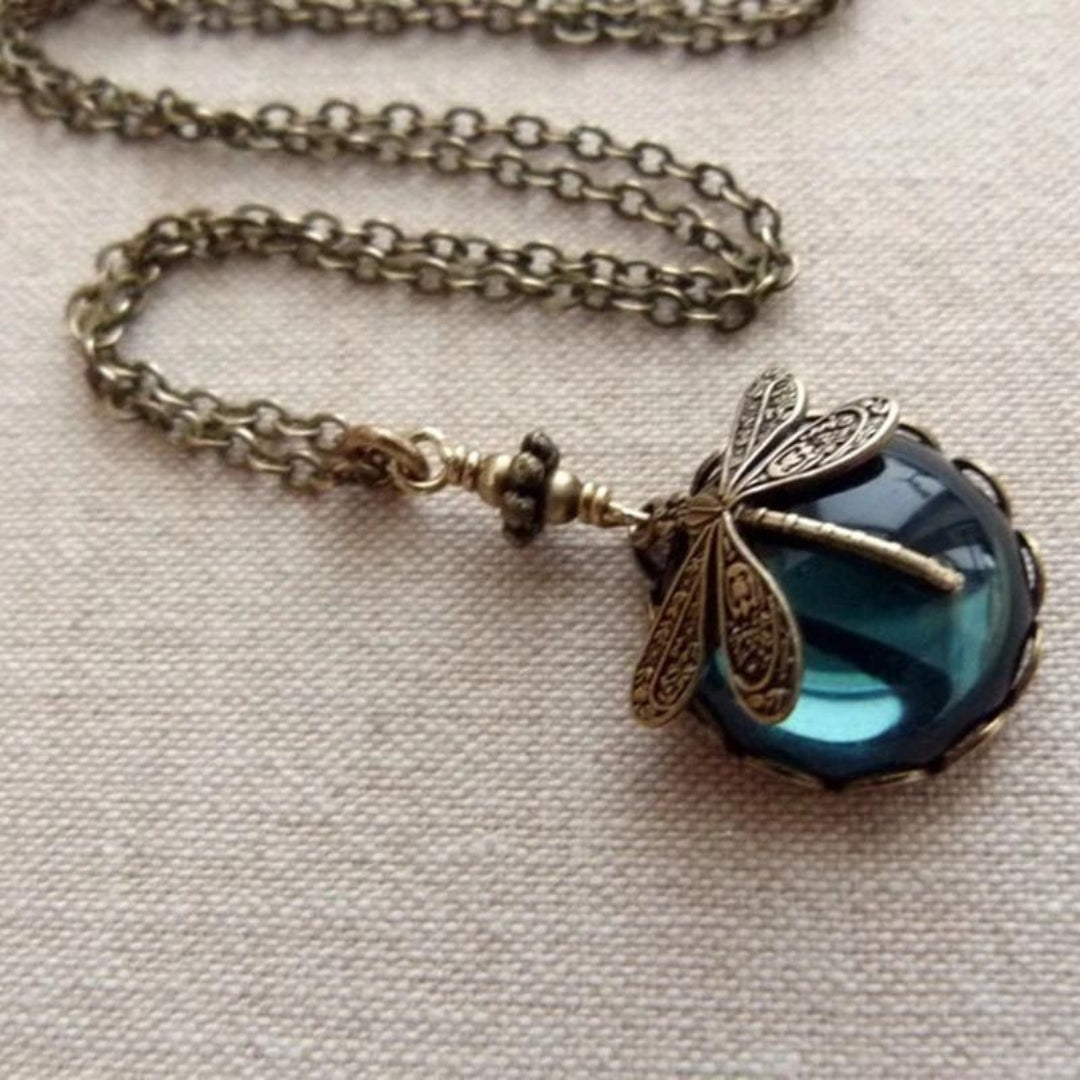 Vintage-Style Dragonfly on Blue Glass Orb Pendant with Soft Glow