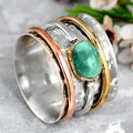 Tri-Tone Spinner Ring with Blue-Green Stone Accent