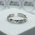 Fiskring i vintagestil med lekfull design, silverfärgad