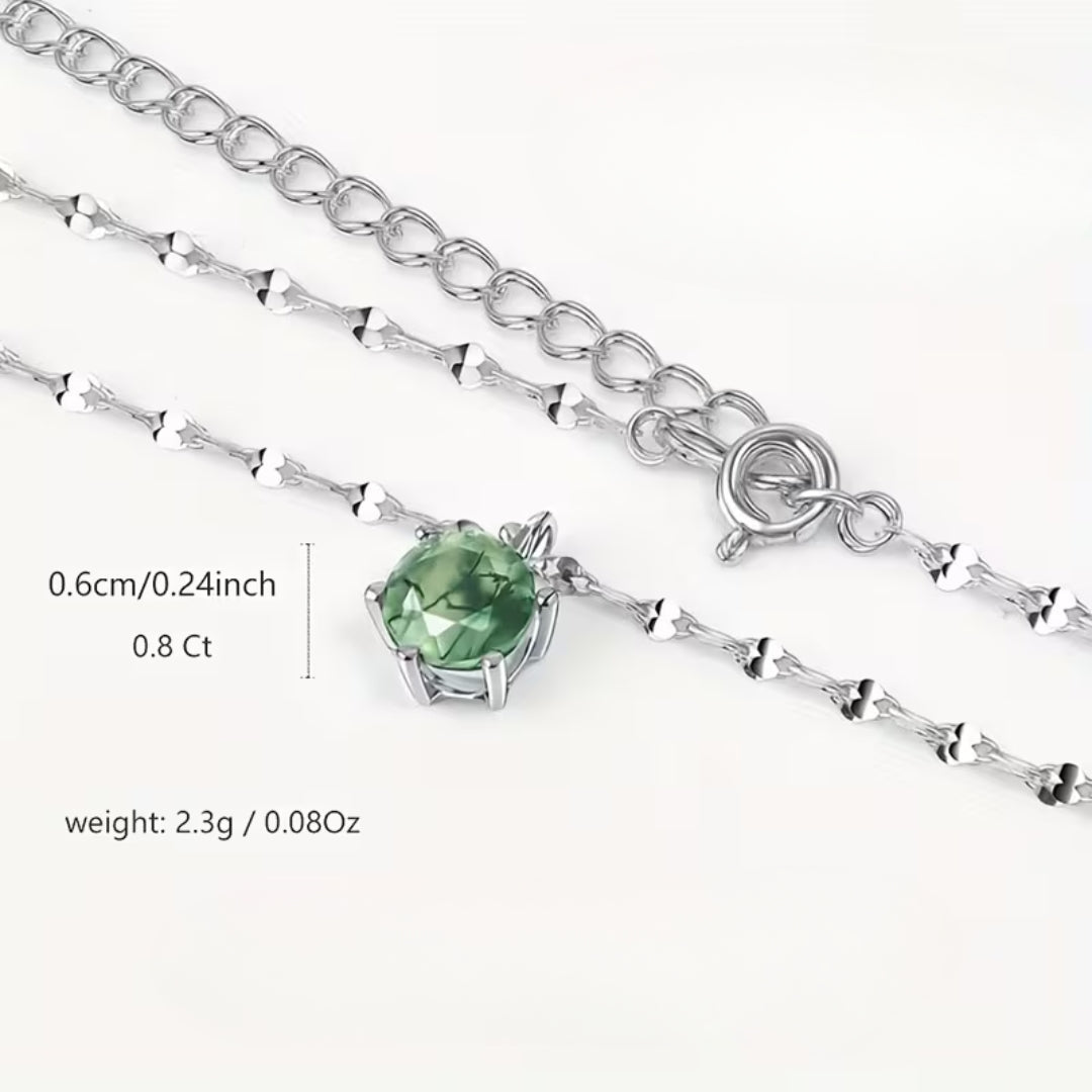Halsband med rund grön sten med mossmönster och naturlig look