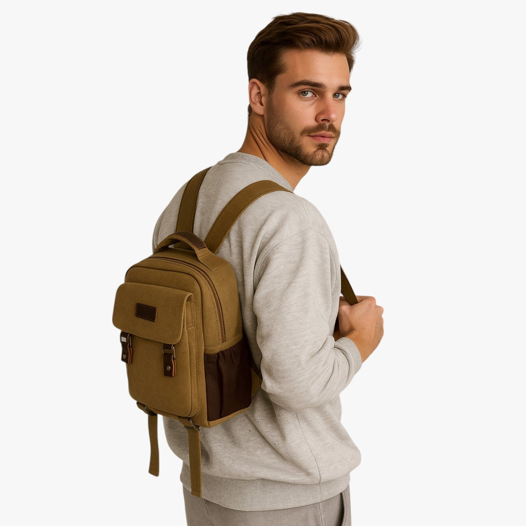 Mini mochila de lona con ribetes de piel sintética