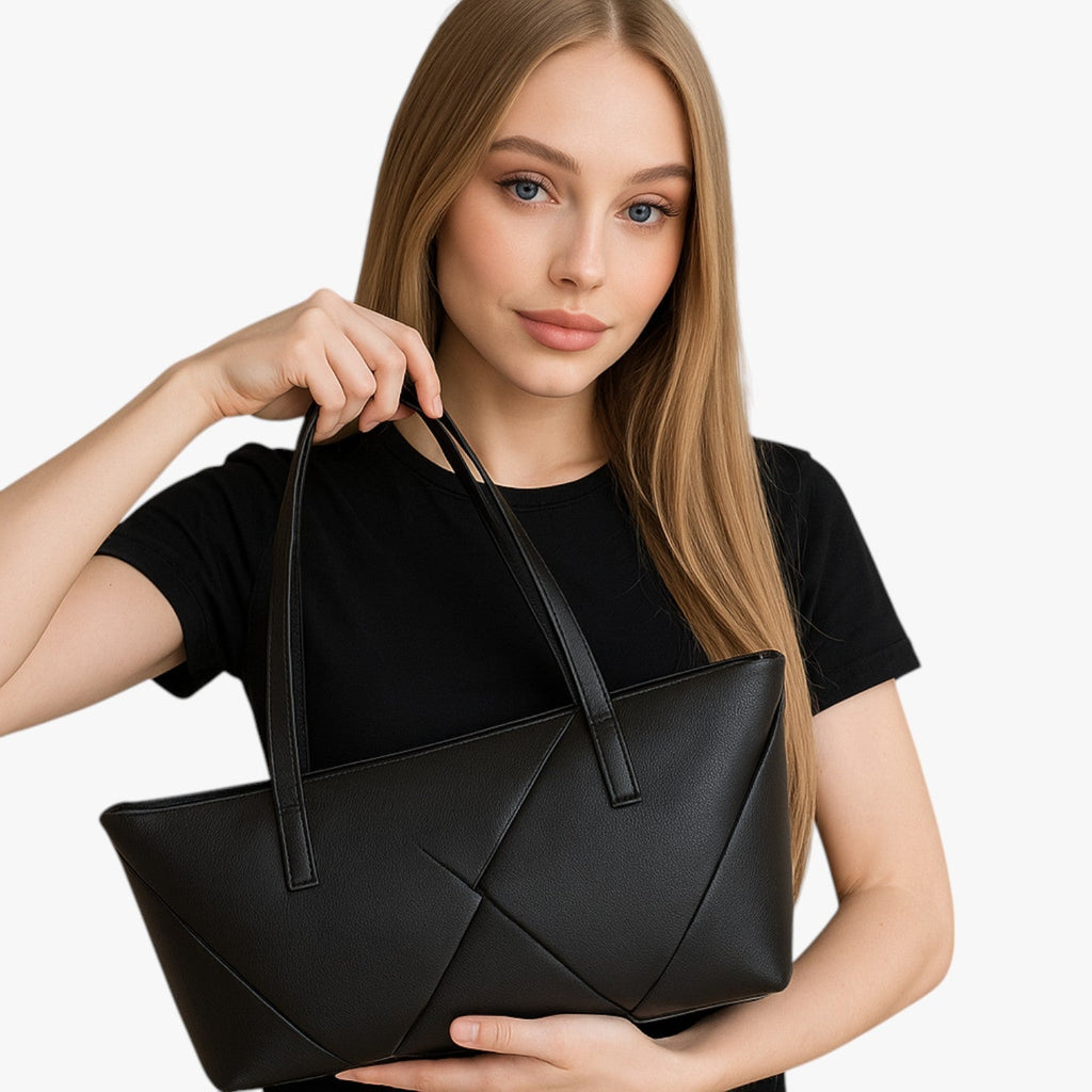 Strukturerad crossbodyväska i konstläder med justerbar rem