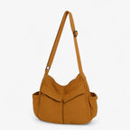 Vintage Canvas Shoulder Bag with a Flap Closure
