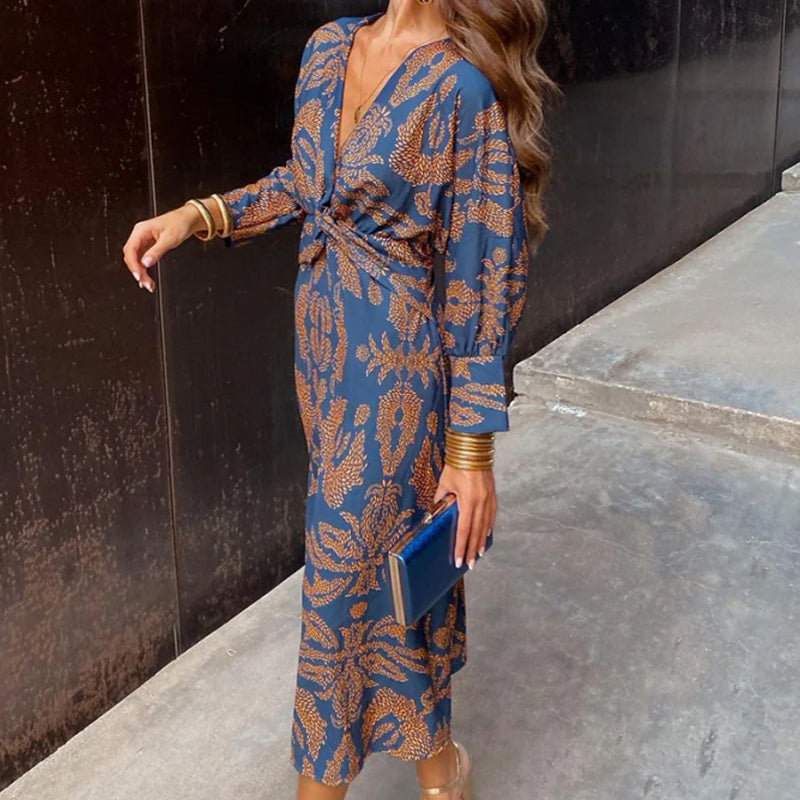 Vestido largo estampado con escote de pico y manga larga
