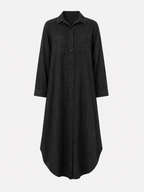 Vestido camisero con botonadura y corte fluido y holgado