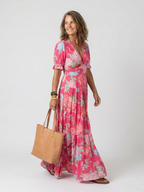 Vestido midi de estampado floral con cuello de pico y manga corta