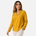 Blusa de algodón de corte holgado con cuello de pico y cuello chal