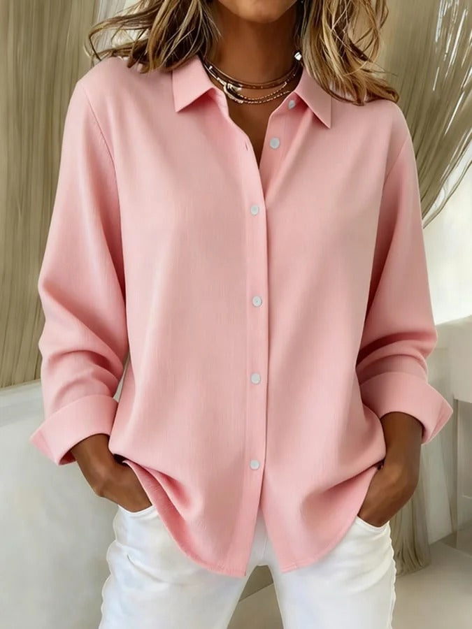 Elegant blus i klar färgskala