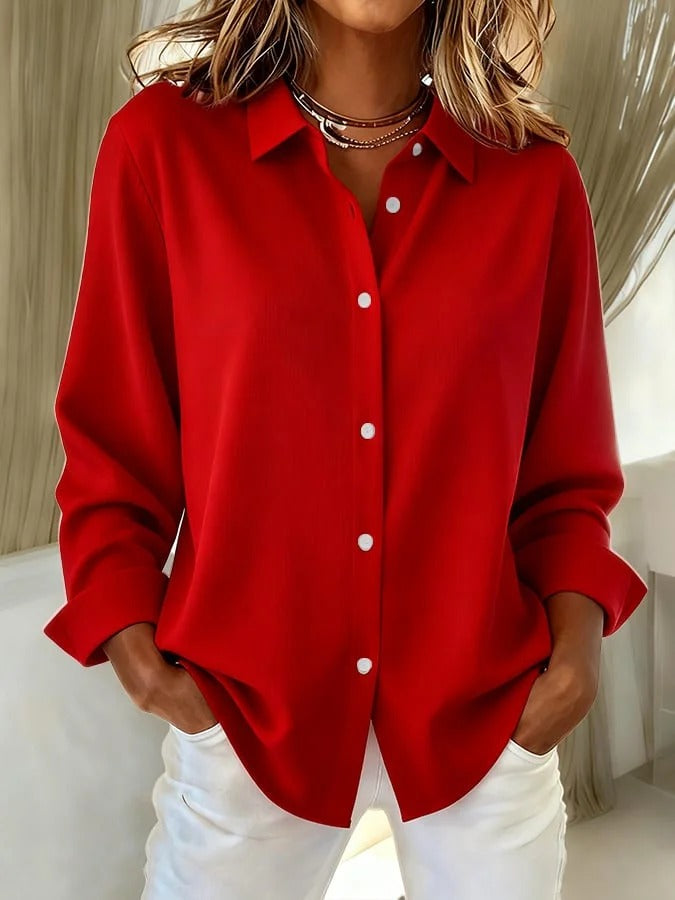 Elegant blus i klar färgskala