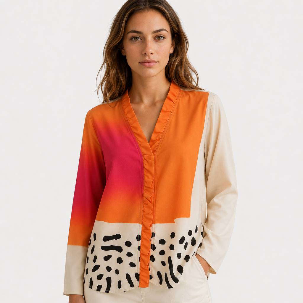 V-ringad blus i colour block med knäppning fram