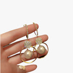 Oversized Pearl Earrings with Golden Accents