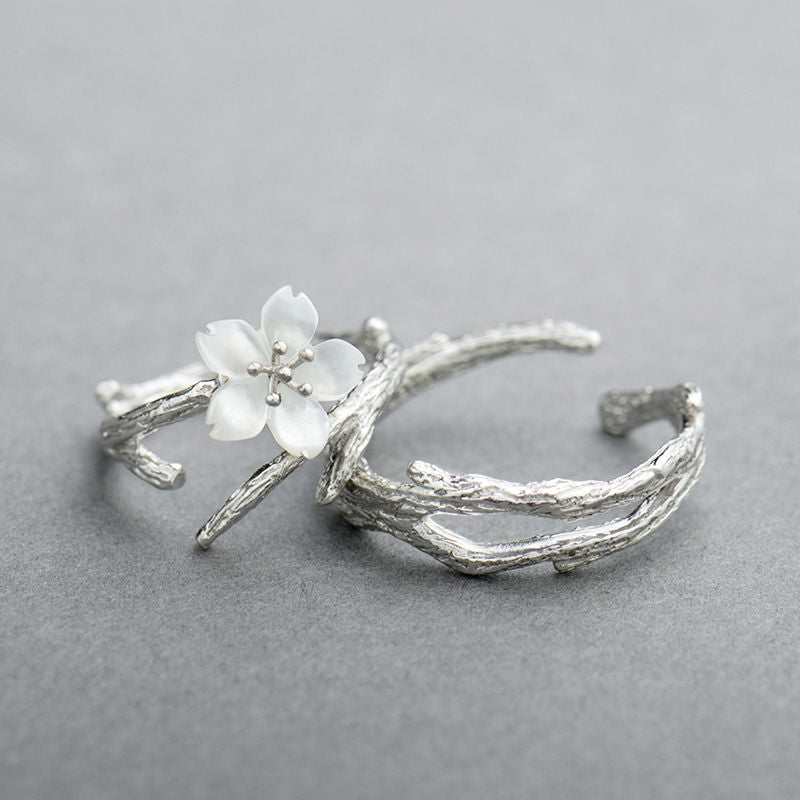 Adjustable White Flower Ring on a Branch-Style Band