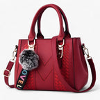 Faux Leather Messenger Bag with Pompon Detail