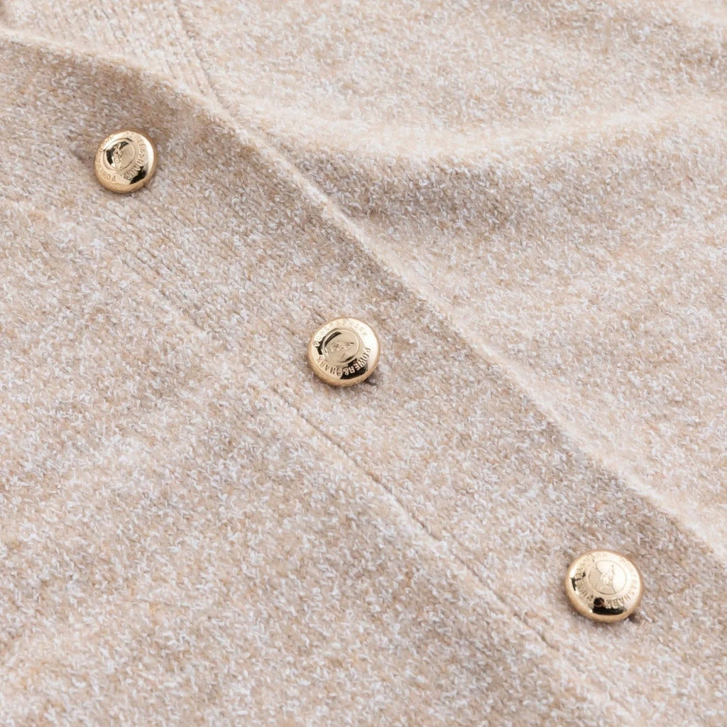 Oversize stickad kofta med V-ringning och mjuk finish