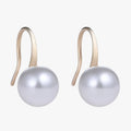 Pendientes de perlas colgantes con detalles de cristal brillante