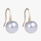 Pendientes de perlas colgantes con detalles de cristal brillante