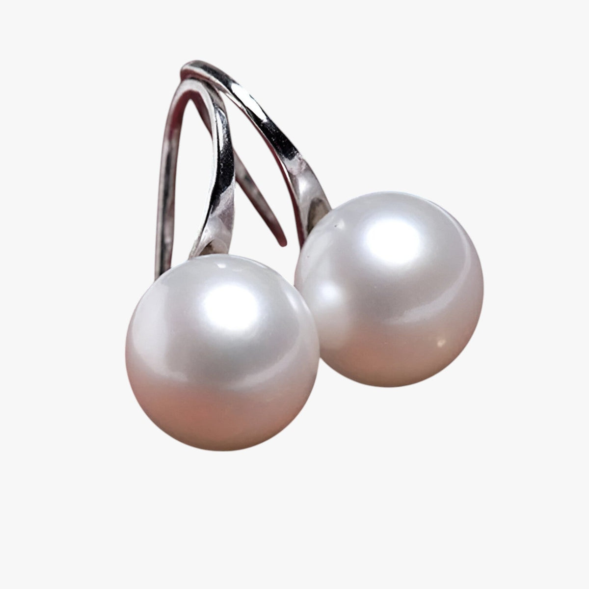 Pendientes de perlas colgantes con detalles de cristal brillante