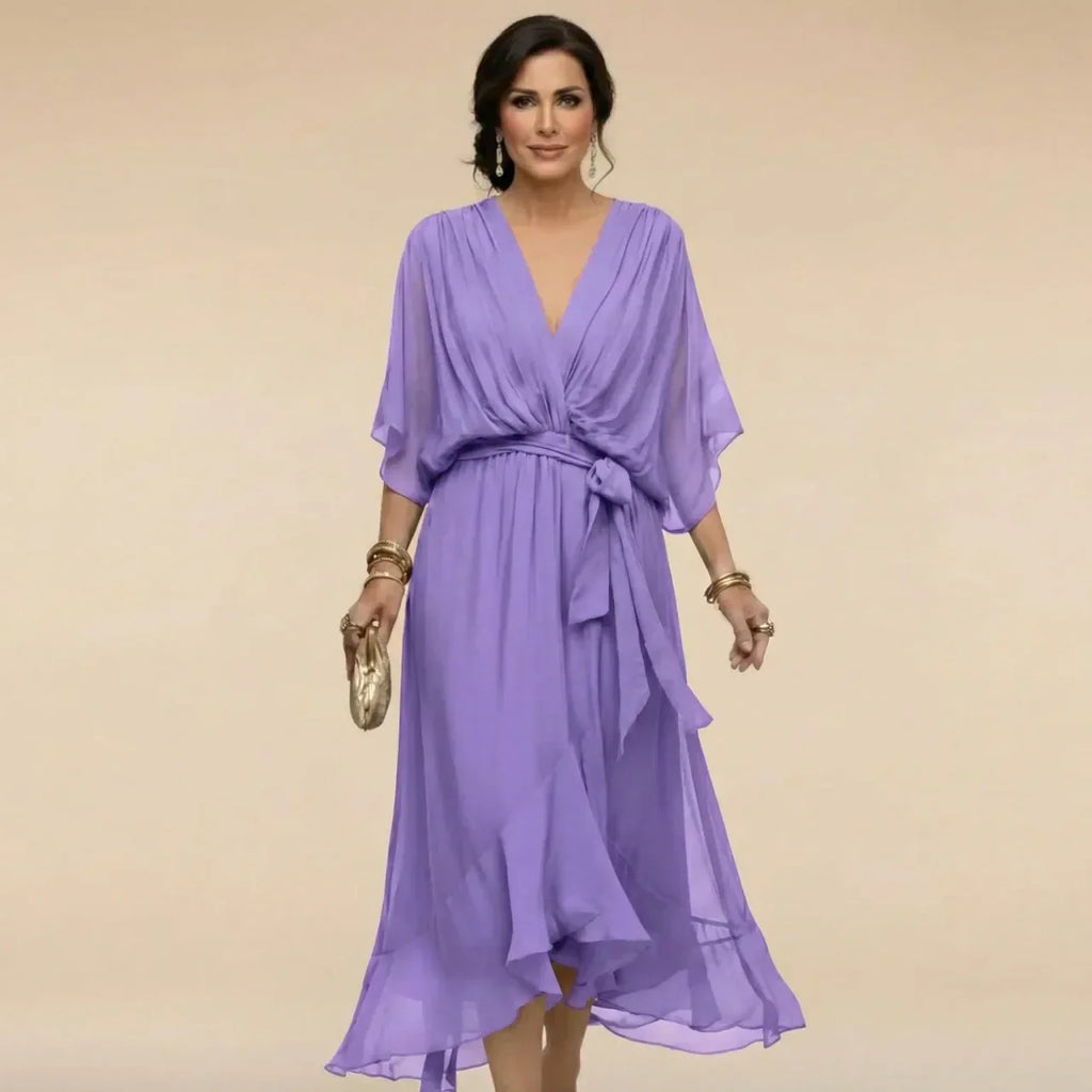 Flowing V-neck dress with soft draping detail