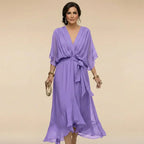 Flowing V-neck dress with soft draping detail