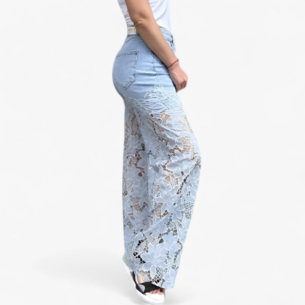 Moderna jeans med eleganta spetsapplikationer