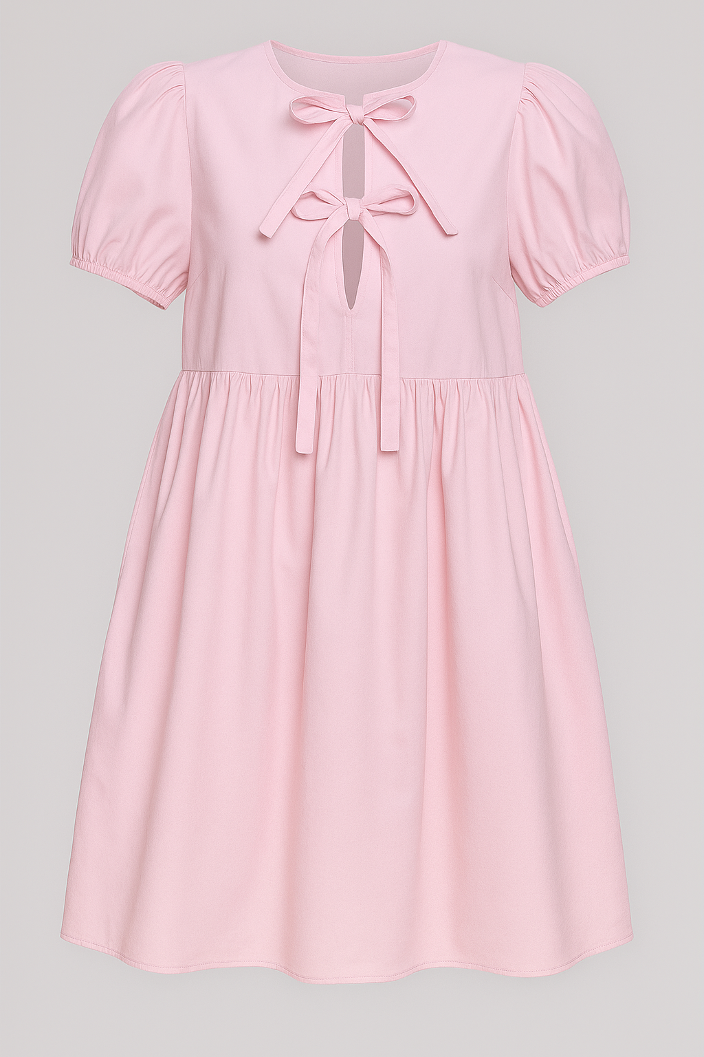 Vestido de manga abullonada con un delicado detalle de lazo delantero