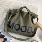 Bolso de lona estampada con asas de hombro ajustables